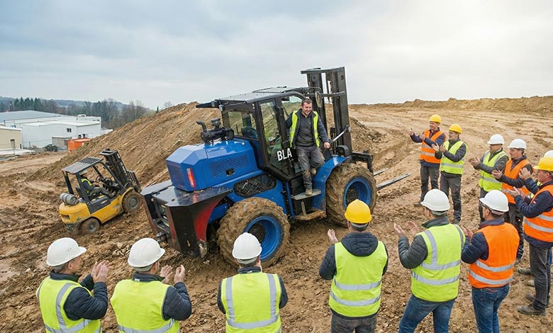 A BLANC-ELE 4WD rough terrain forklift securely handling a load on a steep, uneven hill.