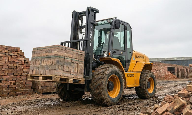 Stable Forklift Carrying Concrete Blocks A forklift with a wide, stable base carrying a tall pallet of blocks securely on uneven terrain.