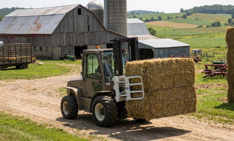 forklift with bale clamp handling hay bales on farm bale-clamp-farm.jpg
