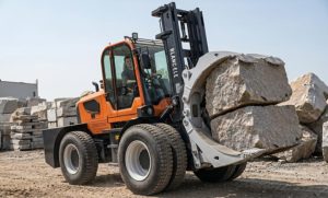 BLANC-ELE-forklift-using-clamp-attachment-to-handle-stone-blocks