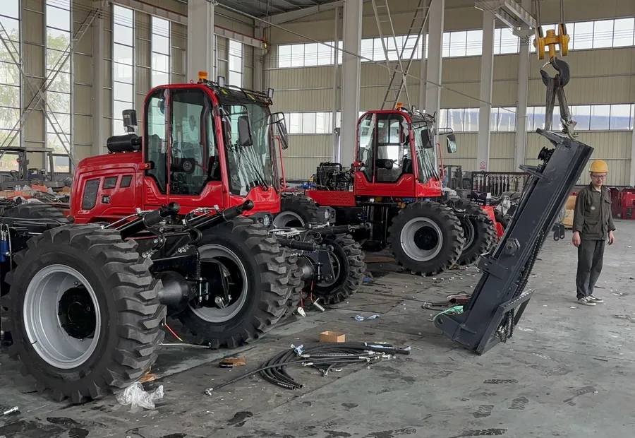 Rough terrain forklifts being configured and checked before export quote confirmation