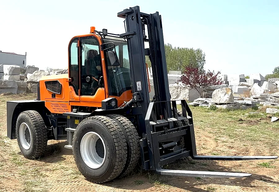 7 ton rough terrain forklift on an outdoor stone-yard route for heavy material handling