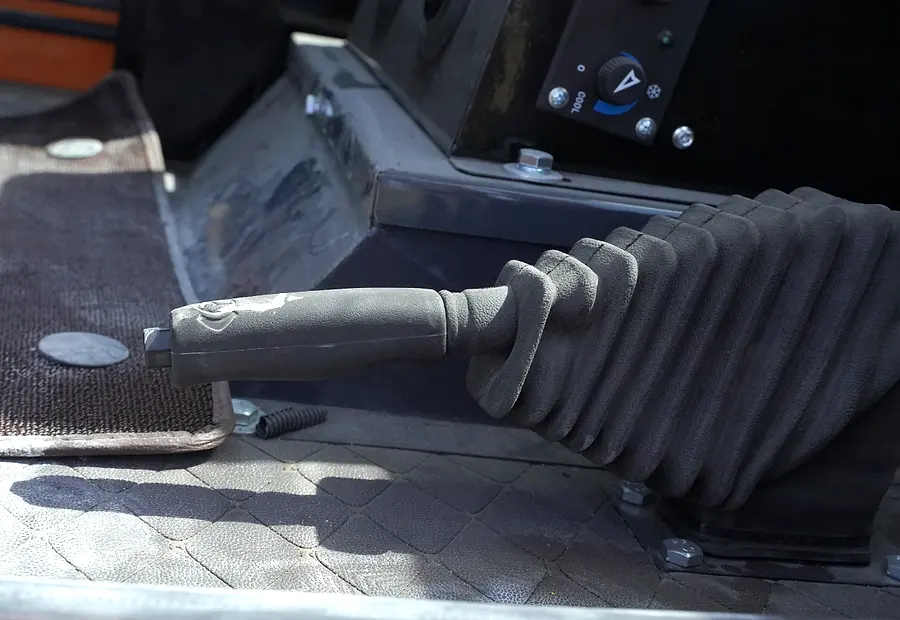 Operator control lever area inside a BLANC-ELE RT70 forklift cab