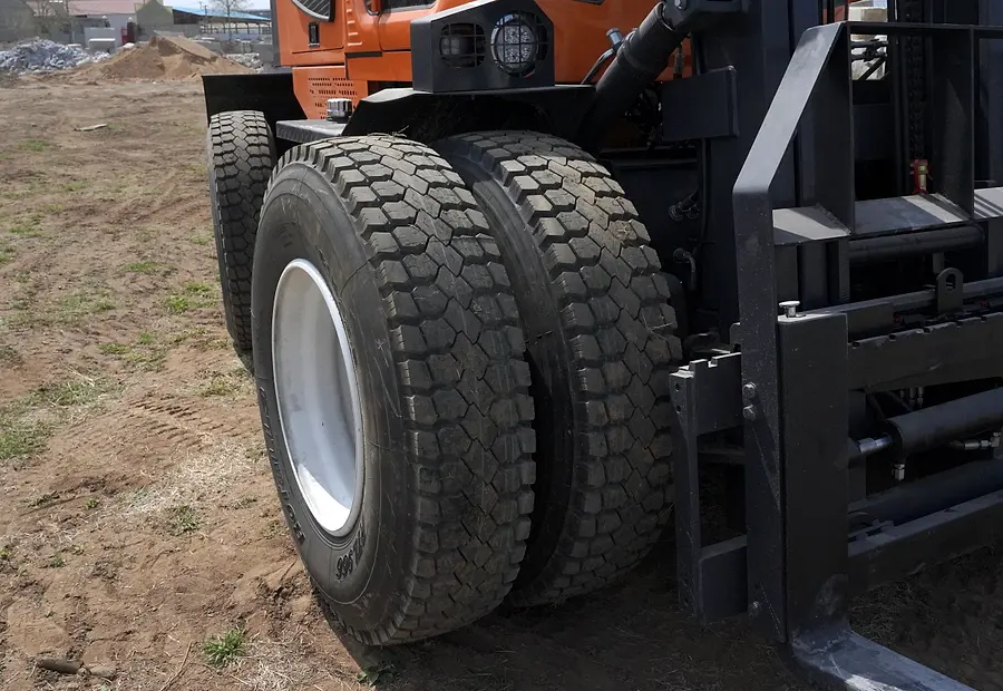 Deep tread tyres on a rough terrain forklift for quarry and mining ground
