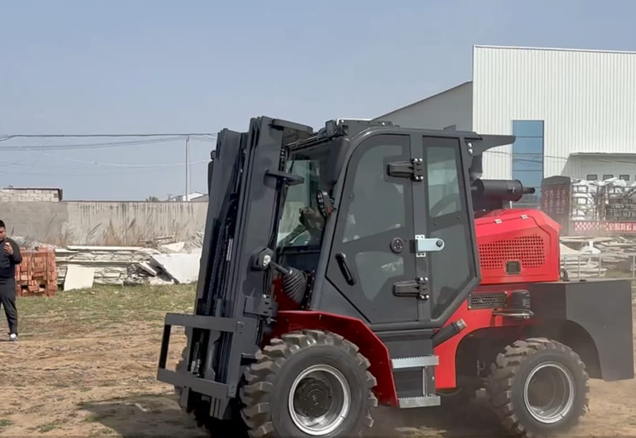 Rough terrain forklift working on an outdoor route where ramp slope and ground condition should be checked before order