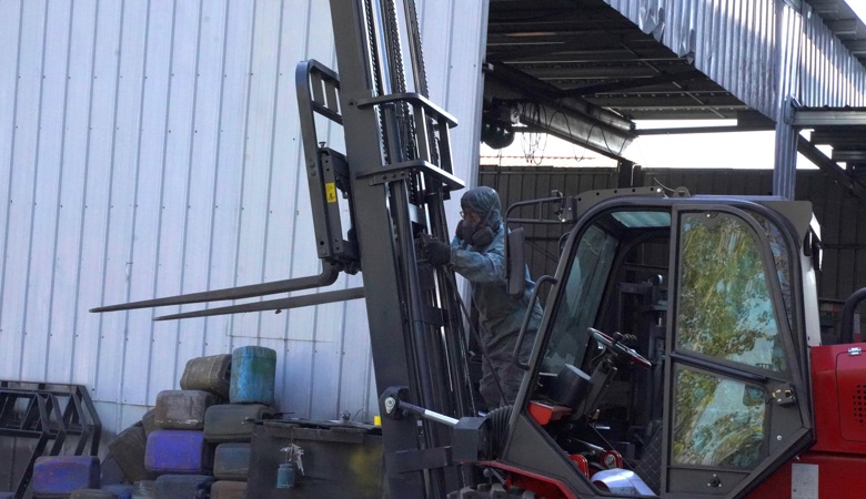 A BLANC-ELE rough terrain forklift being checked during factory preparation.